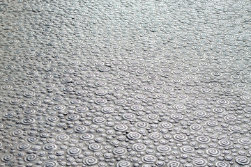 Pattern on corrugated metal surface. Underfoot metal texture