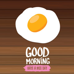 good morning concept. breakfast fried chicken egg with a orange yolk in the center of the fried egg flat laying on wooden table background. top view