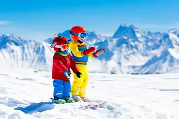 Keuken foto achterwand Wintersport Ski and snow winter fun for kids. Children skiing.