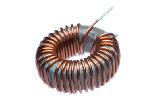 Close up inductor copper coils isolated on white background
