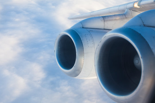 Cloudscapes and Engines Seen From the Airplane