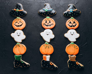 Funny delicious ginger biscuits for Halloween on the table. horizontal view from above