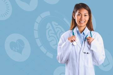 Composite image of asian doctor holding stethoscope