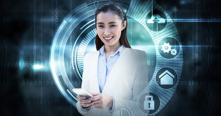 Composite image of smiling businesswoman using smartphone
