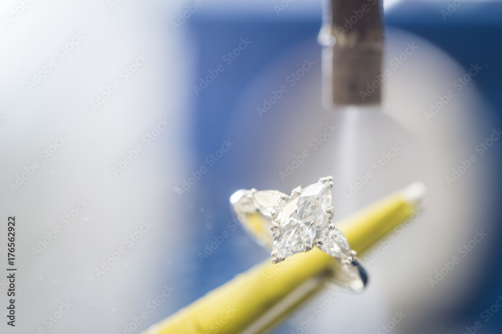 Wall mural cleaning of precious diamond ring