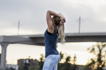 A woman catching her breath after running