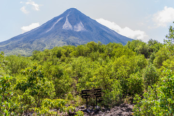 Volcano Arenal behind a lava field in National Park Arenal, Costa Rica