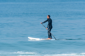 Stand up paddle surfer