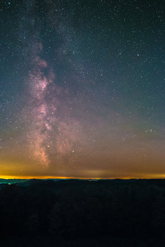 The center of the Milky Way as seen from the Schänzel Tower on the summit of the mountain Steigerkopf in the Palatinate Forest near Edenkoben in Germany.