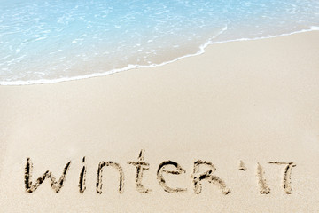 Winter 2017 sign on a sand near sea ocean tropic beach
