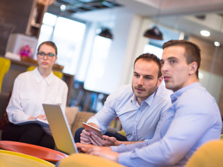 Startup Business Team At A Meeting at modern office building