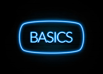 Basics  - colorful Neon Sign on brickwall