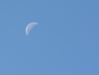 Quarter Moon in Blue Sky