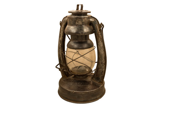 Old Rusty Kerosene Lamp On A White Background