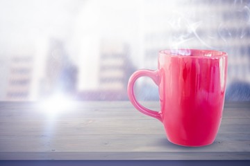 Composite image of red mug on white background