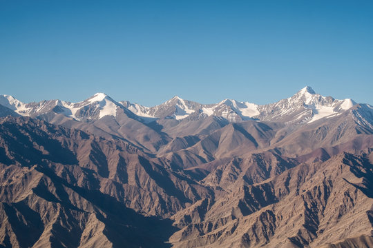 Closeup image of the Himalaya mountain in winter with clear blue sky