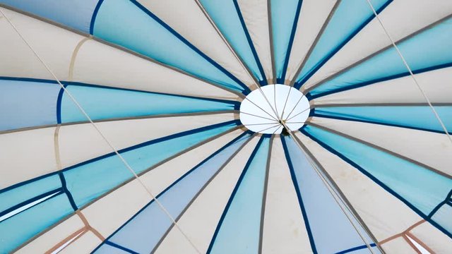 Abstract of blue and white parachute or parasailing in transport and travel concept.