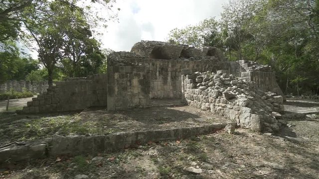 Ruins near monument of Maya Warriors with thousand stone columns on Yucatane peninsula in sunny summer day