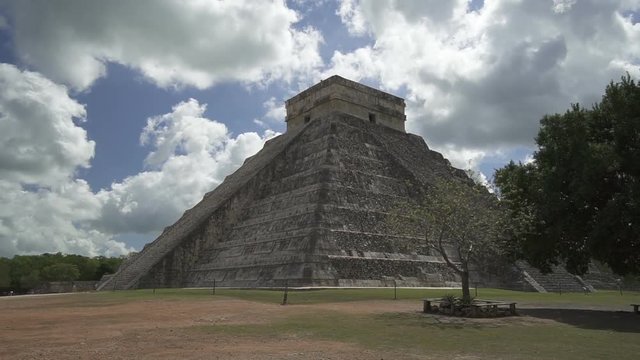 Backward movement from high Maya pyramid temple on Yucatane peninsula in summer sunny day