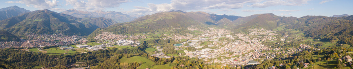 Fototapeta na wymiar Drone aerial view to the villages of Leffe, Gandino, Casnigo, Peia and Cazzano Sant Andrea, located at Gandino Valley, Bergamo, Italy