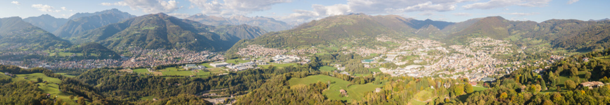 Drone aerial view to the villages of Leffe, Gandino, Casnigo, Peia and Cazzano Sant Andrea, located at Gandino Valley, Bergamo, Italy