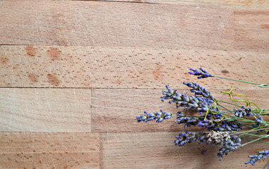 Obraz na płótnie Canvas fresh lavender flowers on white wood table background