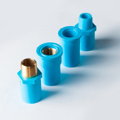 Group of PVC connector and fitting with screw on white background