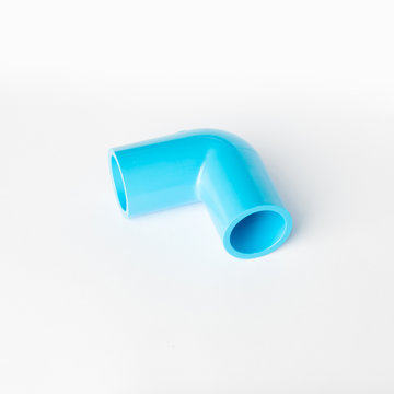 Blue corner PVC pipe fitting on white background