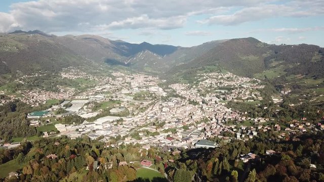 4K Drone aerial view to the villages of Leffe, Gandino, Peia and Cazzano Sant Andrea, located at Gandino Valley, Bergamo, Italy during autumn season