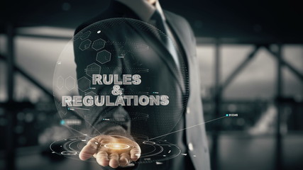 Rules Regulations with hologram businessman concept