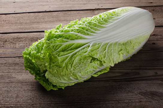 fresh chinese cabbage on a wooden background