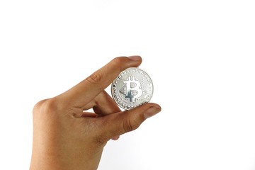 Hand Holding Silver Bitcoin isolated on white background