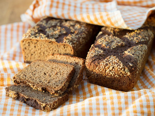 Home made rye sourdough bread on a wooden table