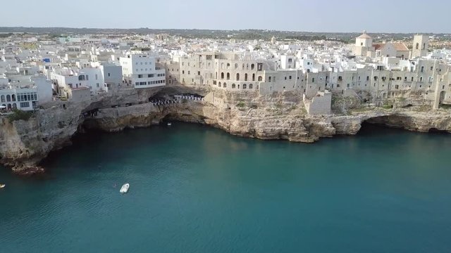 Polignano a Mare (Bari, Italy): heaven on earth. Coastal and caves aerial 4k drone footage video above sea