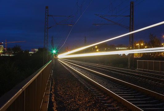 Train Trails In Night On Long Exposure With Green Light