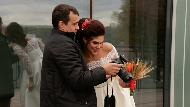 The bride watching had just taken photos