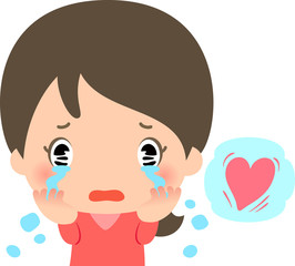 感動して涙を流す若い女性