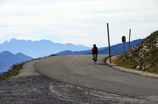 Cyclist arriving at Semnoz summit, Savoy, France
