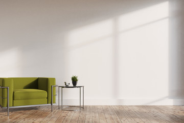 Minimalistic living room, green armchair