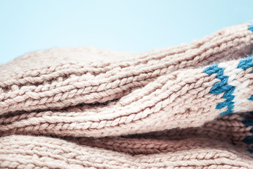 large folds on the warm knit light scarf