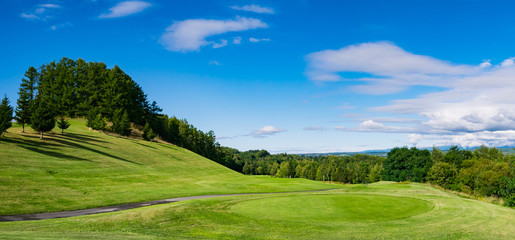 Golf Course where the turf is beautiful and green in Hokkaido, Japan. Golf is a sport to play on the turf	