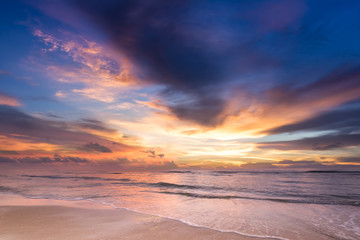 Fototapeta na wymiar Scene of beautiful pastel sweet sunset sunrise twilight sky over sea beach.