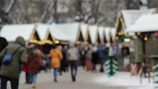 Christmas Fair in the day/people at the Christmas Fair every day are blurred