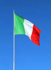 Italian flag waving with blue sky