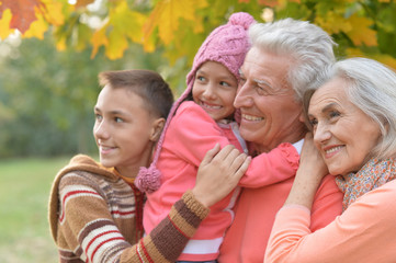 Fototapeta premium happy grandparents and grandchildren
