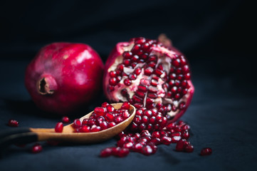 fresh pomegranate on a black background