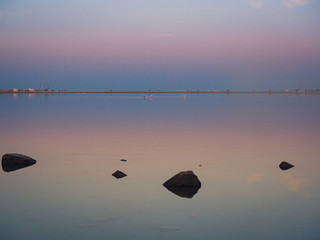 Notteri Pond (famous for the presence of pink flamingos) at dusk. Sardinia, Italy.