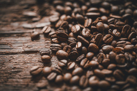 coffee beans on a wooden background selective focus