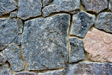 background texture of stone, crushed stone and brick