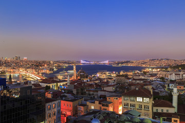 Fototapeta na wymiar Istanbul view from down town of the city during the twilight with beatiful atmospheric blue sky and city lights